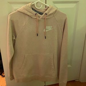 Light pink Nike hoodie.